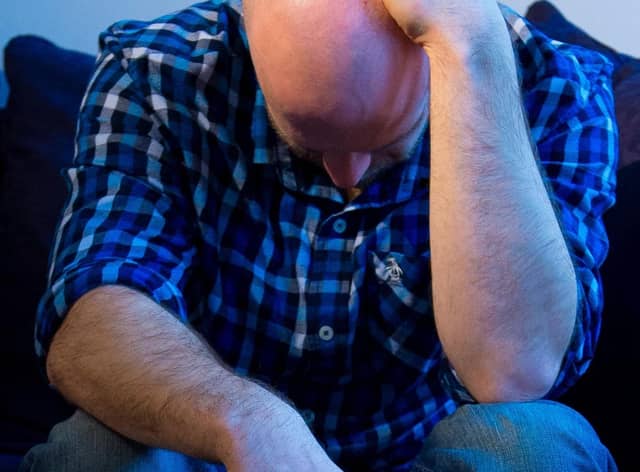 A man showing signs of depression. Picture: Dominic Lipinski/PA Wire
