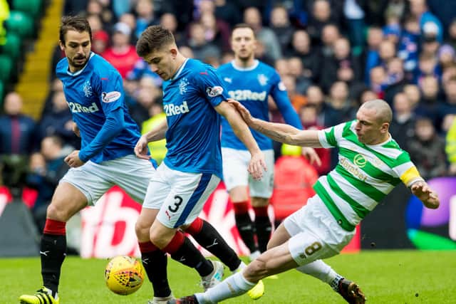 Rangers Declan John is tackled by Scott Brown on the December 2017 afternoon he helped the Ibrox men to a first derby clean-sheet in 13 meetings with Celtic (Pic: SNS Group/Alan Harvey)