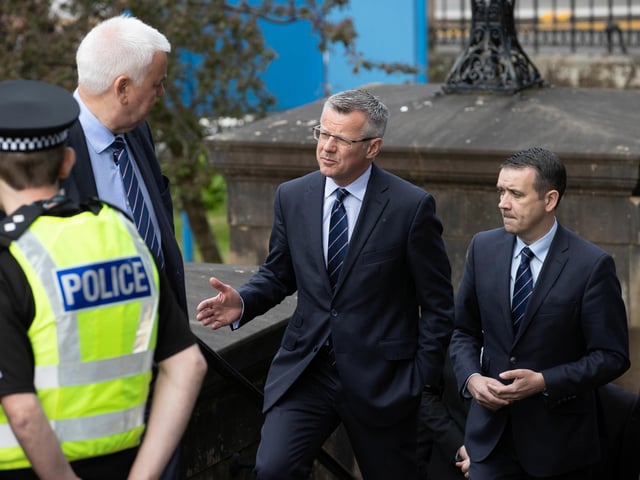 Rangers managing director Stewart Robertson arrives at the funeral of Rangers kitman Jimmy Bell