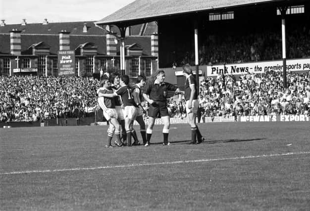 Referee Ian Foote struggles to restore order as Hearts and Hibs get over-excited about the return of the Edinburgh derby in 1978