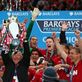 Manchester United manager Sir Alex Ferguson lifts the Premier League trophy at Old Trafford in May 2013 (Picture: Alex Livesey/Getty Images)