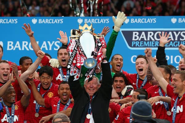 Manchester United manager Sir Alex Ferguson lifts the Premier League trophy at Old Trafford in May 2013 (Picture: Alex Livesey/Getty Images)