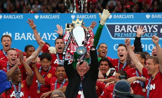 Manchester United manager Sir Alex Ferguson lifts the Premier League trophy at Old Trafford in May 2013 (Picture: Alex Livesey/Getty Images)