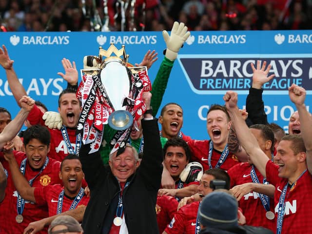 Manchester United manager Sir Alex Ferguson lifts the Premier League trophy at Old Trafford in May 2013 (Picture: Alex Livesey/Getty Images)