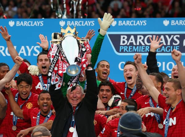 Manchester United manager Sir Alex Ferguson lifts the Premier League trophy at Old Trafford in May 2013 (Picture: Alex Livesey/Getty Images)