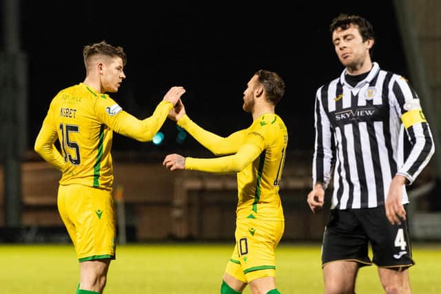 Martin Boyle (centre) celebrates with team-mate Kevin Nisbet afetr scoring from the penalty spot to give Hibs victory over St Mirren. Photo by Ross Parker / SNS Group