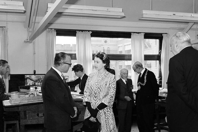 Queen Elizabeth II being shown round Templetons Carpet Factory during her 1964 Glasgow visit.