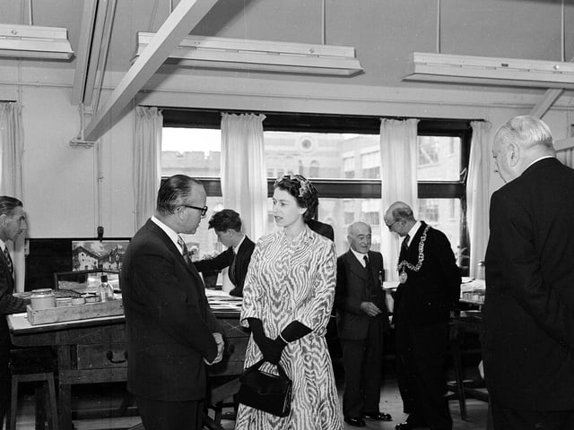 Queen Elizabeth II being shown round Templetons Carpet Factory during her 1964 Glasgow visit.