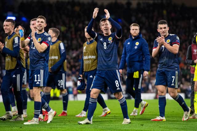 Scotland players celebrate the 2-0 win over Denmark at Hampden on November 15. (Photo by Ross MacDonald / SNS Group)