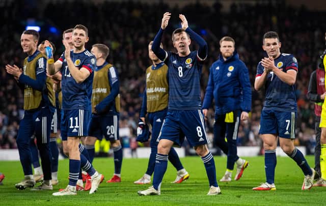 Scotland players celebrate the 2-0 win over Denmark at Hampden on November 15. (Photo by Ross MacDonald / SNS Group)