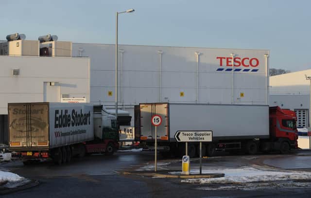 Up to 290 staff at Tesco's Livingston distribution centre are affected by the pay cut plan