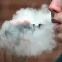 A man vaping, as researchers are searching for volunteers to take part in a new study being launched into the potential health effects of passive vaping. Picture: Nicholas.T.Ansell/PA Wire