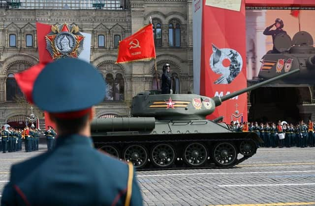 The solitary Soviet era T-34 tank parades through Red Square during the general rehearsal of the Victory Day military parade in central Moscow at the weekend.