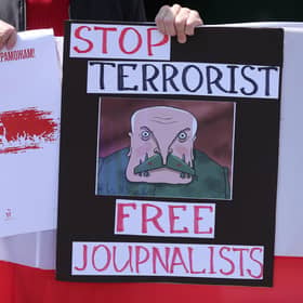 Members of the Belarusian community in Ireland take part in protest in Dublin in May in support of political prisoners including the journalist Roman Protasevich (Picture: Niall Carson/PA)