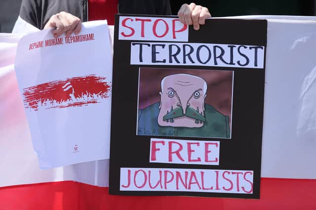 Members of the Belarusian community in Ireland take part in protest in Dublin in May in support of political prisoners including the journalist Roman Protasevich (Picture: Niall Carson/PA)