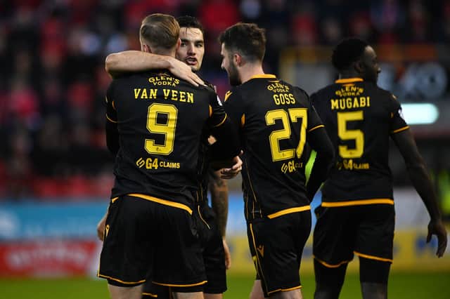 Motherwell's Kevin van veen celebrates making it 2-0 with Tony Watt and Sean Goss against Aberdeen.
