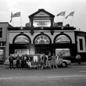 Staff dressed as gangsters beside a stretch limousine to advertise the opening of Fat Sam's Chicago-style diner and bar on the site of the Edinburgh meat market at Fountainbridge in September 1986.