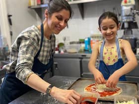 Nazanin Zaghari-Ratcliffe makes pizza with her seven-year-old daughter Gabriella (Picture: PA)