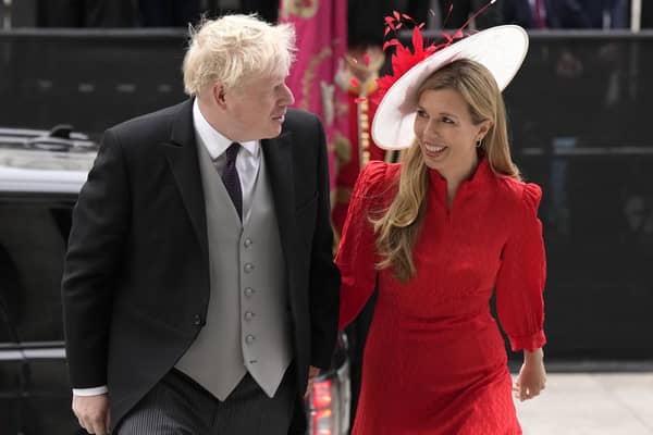 Boris Johnson and his wife Carrie Johnson arrive for a service of thanksgiving for The Queen