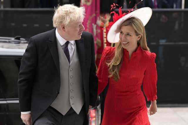 Boris Johnson and his wife Carrie Johnson arrive for a service of thanksgiving for The Queen