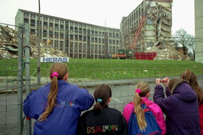It was a front page story in January, 1993, which covered the demolition of the Westburn high flats. Despite the Westburn Gardens’ seven blocks having been in place since the 1970s, they decided to replace them for a new housing development. The above shows some young children intently watching the demolition unfold.