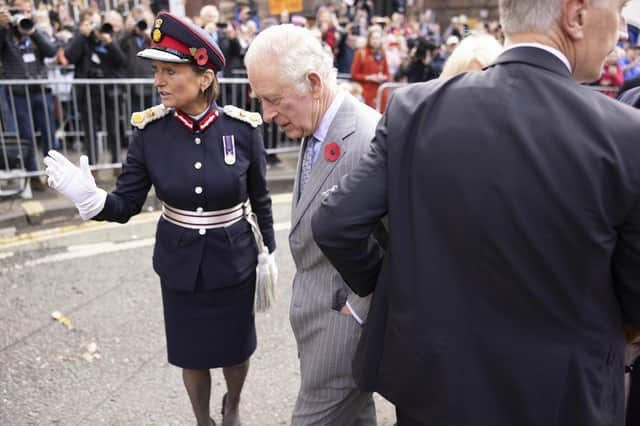 King Charles III reacts after an egg (bottom left) was thrown his direction as he arrived for a ceremony at Micklegate Bar in York, where the Sovereign is traditionally welcomed to the city. Picture date: Wednesday November 9, 2022.