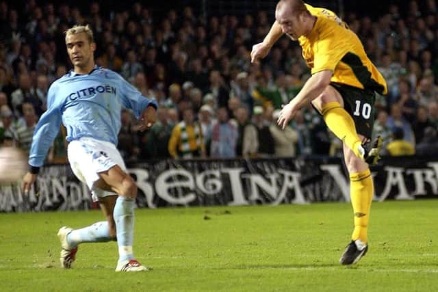 John Hartson (right) fires in the goal  that allowed Celtic to progress to the UEFA Cup fourth round in Viga in December 2002 - the success bringing the clu post-Christmas European football for the first time in 23 years. (Photo by Alan Harvey/SNS).