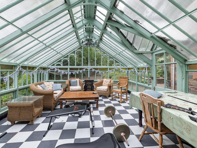 Exterior: A bordered driveway leads to the entrance and with ample space for parking. There is a lawn to the rear.
Contact: Re/max