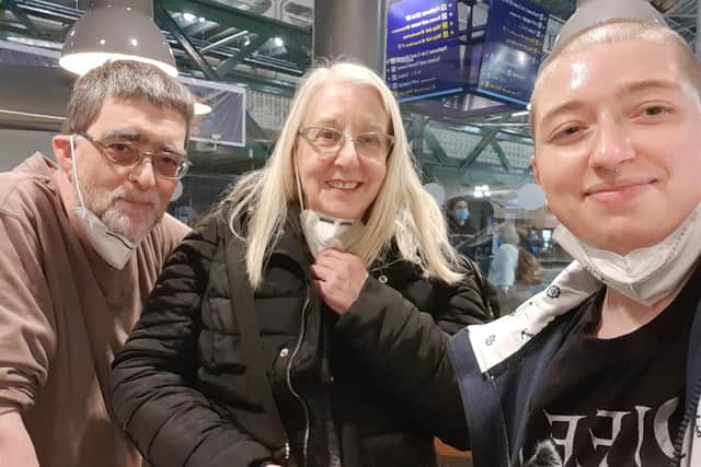 Varvara Shevtsova, from Kyiv, takes her first selfie with her Scottish host family, Harry and Catriona Smart, at Edinburgh's Waverley Station. Picture: Valvara Shevtsova
