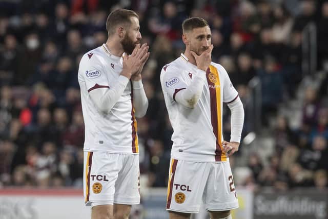 Kevin van Veen, left, handed over penalty duties to his Motherwell team-mate Louis Moult.