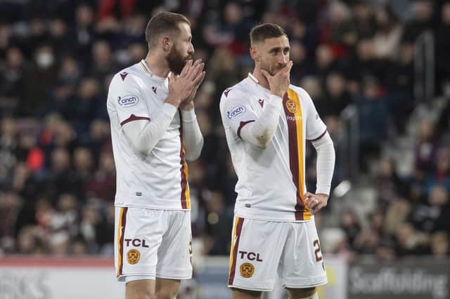Kevin van Veen, left, handed over penalty duties to his Motherwell team-mate Louis Moult.
