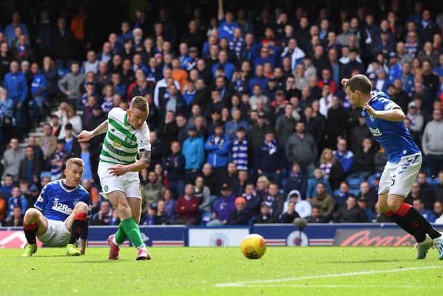 Jonny Hayes scores for Celtic at Ibrox last season. Picture: SNS