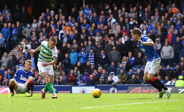 Jonny Hayes scores for Celtic at Ibrox last season. Picture: SNS