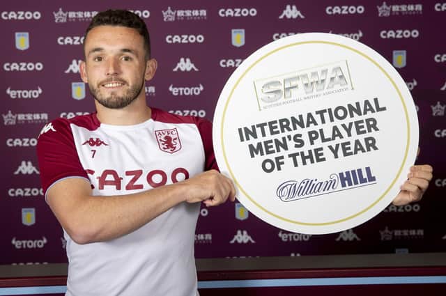 John McGinn has won the Scottish Football Writers' Association International Player of the Year award for the third successive time