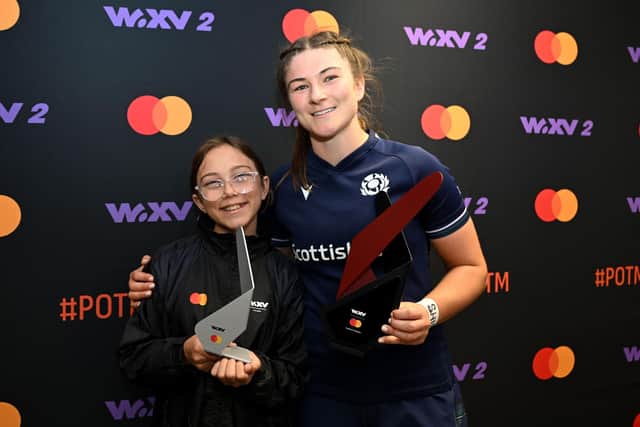Player of the Match, Helen Nelson of Scotland, is presented with a Trophy by the MASTERCARD guest after the WXV 2 2023 match between Scotland and Japan at Athlone Sports Stadium on October 27, 2023 in Cape Town, South Africa. (Photo by Johan Rynners - World Rugby/World Rugby via Getty Images)