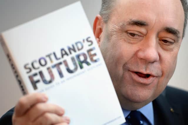Former first minister Alex Salmond presents the White Paper for Scottish independence in November 2013 in Glasgow. Picture: Jeff J Mitchell/Getty Images