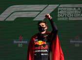 Race winner Max Verstappen of Red Bull Racing celebrates on the podium after the F1 Grand Prix of The Netherlands at Circuit Zandvoort. (Photo by Francisco Seco - Pool/Getty Images)