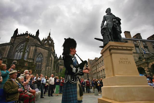 Economist, philosopher and author Adam Smith, whose statue on Edinburgh's Royal Mile was unveiled in 2008, is regarded as the founder of modern economics (Picture: Jeff J Mitchell/Getty Images)