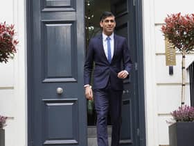Prime Minister Rishi Sunak leaves the Conservative Party headquarters in central London, after the party suffered council losses in the local elections.