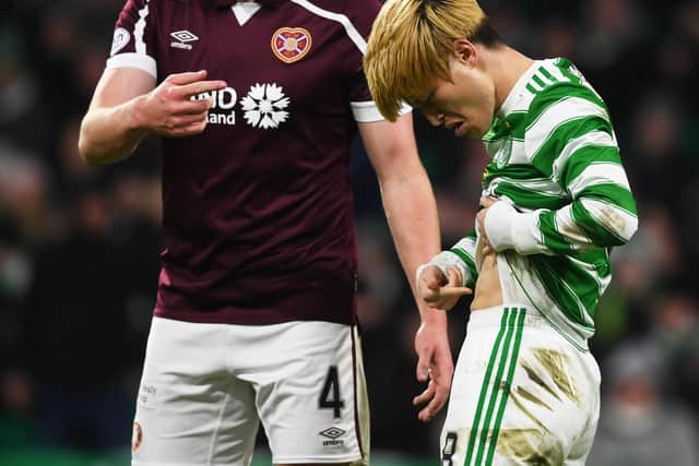 Celtic’s Kyogo Furuhashi points to his stomach after an altercation with John Souttar. (Photo by Craig Foy / SNS Group)