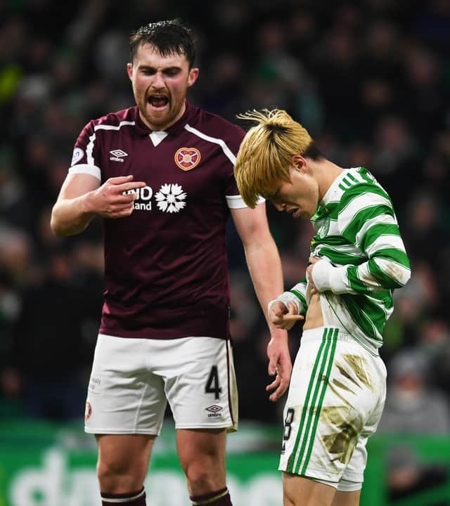 Celtic’s Kyogo Furuhashi points to his stomach after an altercation with John Souttar. (Photo by Craig Foy / SNS Group)