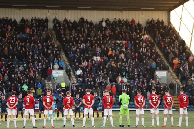 An immaculate minute's silence for former Raith Rovers chairman Bill Clark, who died on Monday, was observed pre-match (Photo by Ross MacDonald / SNS Group)