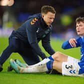 Everton's Nathan Patterson receives treatment during the 4-1 defeat to Brighton. Picture date: Tuesday January 3, 2023.