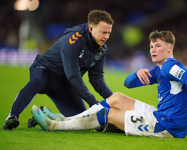 Everton's Nathan Patterson receives treatment during the 4-1 defeat to Brighton. Picture date: Tuesday January 3, 2023.