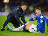 Everton's Nathan Patterson receives treatment during the 4-1 defeat to Brighton. Picture date: Tuesday January 3, 2023.