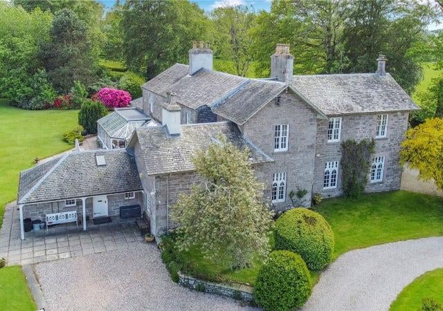 Located in sprawling grounds to the west of Perth, West Mains of Huntingtower includes three separate properties for offers over £1.5 million. There's an eight bedroom period country house complete with a conservatory and wine cellar, plus a three bedroom cottage and a one bedroom cottage. Outside there's 4.4 acres of sweeping lawns, an orchard, a walled garden, a tennis court, a paddock and a copse of woodland.