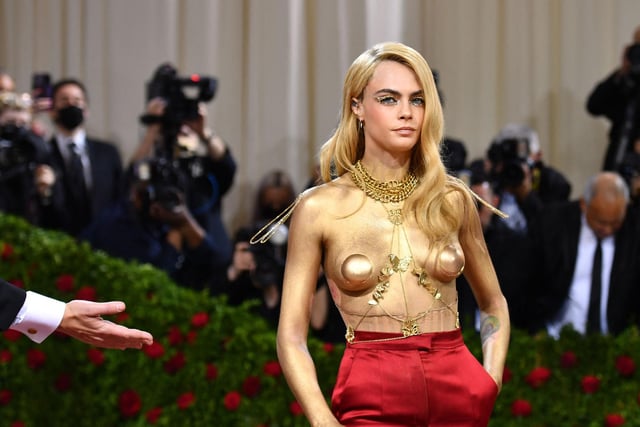 British model Cara Delevingne arrives for the 2022 Met Gala at the Metropolitan Museum of Art on May 2, 2022, in New York. Photo by ANGELA WEISS/AFP via Getty Images