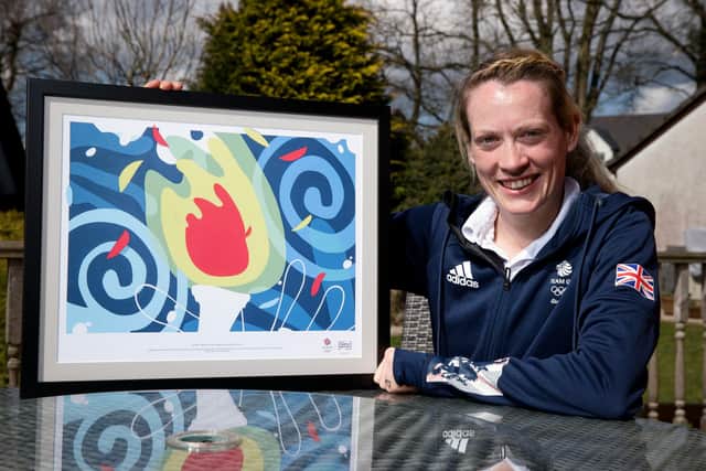 Olympic medallist Eilidh Doyle shows off footballer Leighton McIntosh's painting which will be displayed on billboards to encourage fans to get behind Scottish athletes at the Tokyo Olympics. Picture: Craig Williamson/SNS