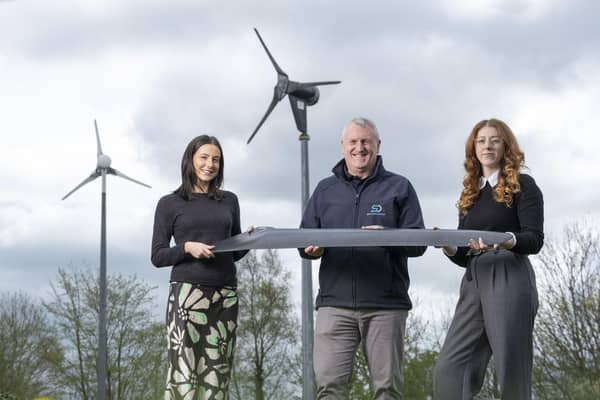 From left: Hannah Cairns and Gary Mutter of SD Wind Energy, and Emma Harrick of Scottish Renewables, at the firm's factory in Stewarton. Picture: contributed.