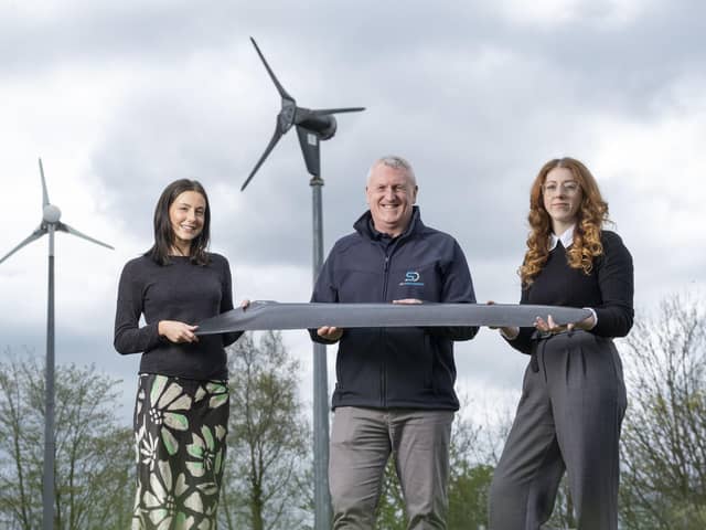 From left: Hannah Cairns and Gary Mutter of SD Wind Energy, and Emma Harrick of Scottish Renewables, at the firm's factory in Stewarton. Picture: contributed.